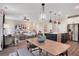 Open concept dining area with wood table and kitchen views at 366 Boundless Ln, Canton, GA 30114