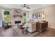 Living area with stone fireplace, hardwood floors, and natural light at 366 Boundless Ln, Canton, GA 30114