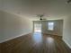 Bright living room with hardwood floors, sliding glass doors, and a ceiling fan at 366 Boundless Ln, Canton, GA 30114