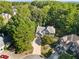 Two-story house with a large driveway and beautiful landscaping at 503 W Green Ct, Woodstock, GA 30189