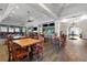 Spacious dining area with wood floors and tables at 503 W Green Ct, Woodstock, GA 30189