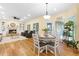 Spacious living room features built-in shelving, fireplace, and hardwood floors at 503 W Green Ct, Woodstock, GA 30189