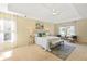 Bright main bedroom with carpeted floors and ample natural light at 503 W Green Ct, Woodstock, GA 30189