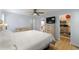 Main bedroom with a TV, hardwood floor and walk-in closet at 626 Dover St, Marietta, GA 30066