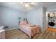 Comfortable bedroom with a view to the closet and laundry area at 626 Dover St, Marietta, GA 30066