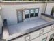 Overhead balcony area with dark trim and a view of the flat roof at 1017 Brandsford Nw St, Atlanta, GA 30318