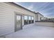 Spacious balcony area with sliding glass doors, a row of windows, and light siding at 1017 Brandsford Nw St, Atlanta, GA 30318