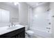 Modern bathroom features a sleek vanity, shower-tub combo, and contemporary fixtures at 1017 Brandsford Nw St, Atlanta, GA 30318