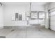 Well-lit garage featuring modern electrical panels and a clean, concrete floor at 1017 Brandsford Nw St, Atlanta, GA 30318