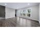 Bright living room with hardwood floors, large windows, and deck access at 1017 Brandsford Nw St, Atlanta, GA 30318