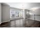 Bright living room with large windows and hardwood floors in neutral decor at 1017 Brandsford Nw St, Atlanta, GA 30318