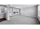 Spacious open-concept living room with natural light and access to the outdoors at 1017 Brandsford Nw St, Atlanta, GA 30318