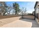 Outdoor patio with privacy wall and partial tree view at 1017 Brandsford Nw St, Atlanta, GA 30318