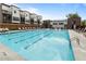 A serene community pool surrounded by lounge chairs offers a relaxing outdoor retreat at 1017 Brandsford Nw St, Atlanta, GA 30318