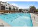 Inviting community pool surrounded by modern residences and comfortable lounge seating at 1017 Brandsford Nw St, Atlanta, GA 30318