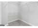 Spacious walk-in closet with wire shelving for optimal storage and organization at 1017 Brandsford Nw St, Atlanta, GA 30318
