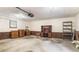 A spacious, unfinished garage with storage furniture, including dressers, shelves and a hutch at 2601 Round Ridge Rd, Loganville, GA 30052
