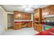 Functional kitchen features ample storage space, a clean design, and durable flooring at 2601 Round Ridge Rd, Loganville, GA 30052