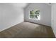 Well-lit bedroom featuring a large window with backyard views at 3227 Diamond Blf, Union City, GA 30291