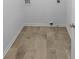 A small laundry room featuring tiled floors at 3227 Diamond Blf, Union City, GA 30291
