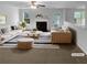 Bright living room with a fireplace, plush seating, and stylish decor at 3227 Diamond Blf, Union City, GA 30291