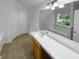 Main bathroom vanity area and large mirror at 3227 Diamond Blf, Union City, GA 30291