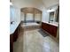 Main bathroom with double vanity and large soaking tub at 89 Grand Oak Way, Dallas, GA 30157