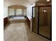 Main bathroom with double vanity, soaking tub and separate shower at 89 Grand Oak Way, Dallas, GA 30157