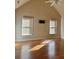 Bright bedroom featuring hardwood floors and a ceiling fan at 89 Grand Oak Way, Dallas, GA 30157