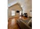 Large bonus room with hardwood floors and vaulted ceiling at 89 Grand Oak Way, Dallas, GA 30157