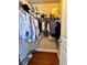 Walk-in closet with ample hanging and shelving space at 89 Grand Oak Way, Dallas, GA 30157