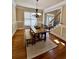 Formal dining room with hardwood floors and a chandelier at 89 Grand Oak Way, Dallas, GA 30157
