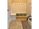 Convenient entryway with built-in bench and storage at 89 Grand Oak Way, Dallas, GA 30157