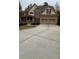 Beautiful two-story home with a large driveway at 89 Grand Oak Way, Dallas, GA 30157