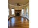 Sunken living room with hardwood floors, stone fireplace and access to deck at 89 Grand Oak Way, Dallas, GA 30157