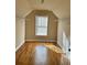 Large walk-in closet with wood floors and double hanging rods at 89 Grand Oak Way, Dallas, GA 30157