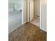 Neutral hallway with carpet leading to a white door room and a bonus space at 3551 Mill Glen Dr, Douglasville, GA 30135