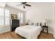 Bright bedroom with hardwood floors and ample closet space at 390 17Th Nw St # 1063, Atlanta, GA 30363