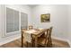 Small dining area with wooden table and chairs at 390 17Th Nw St # 1063, Atlanta, GA 30363