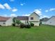 Spacious backyard featuring a well-maintained lawn and private back deck at 277 Players Cir, Fayetteville, GA 30215