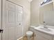 Well-lit bathroom featuring a vanity with sink and a large mirror at 277 Players Cir, Fayetteville, GA 30215