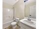 Clean bathroom with a tub, shower, and modern fixtures, offering functionality and comfort at 277 Players Cir, Fayetteville, GA 30215