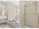 Well-appointed bathroom showcasing a separate shower and soaking tub at 277 Players Cir, Fayetteville, GA 30215