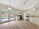 Modern kitchen with stainless steel appliances, granite countertops, and an eat-in area at 277 Players Cir, Fayetteville, GA 30215