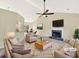 Spacious living room featuring a fireplace, ceiling fan, and comfortable seating at 277 Players Cir, Fayetteville, GA 30215