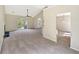 Bright, spacious living room with fireplace, ceiling fan, and plenty of natural light at 277 Players Cir, Fayetteville, GA 30215