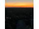 Elevated view of neighborhood with sunset in background at 2870 Pharr Court South Nw # 2407, Atlanta, GA 30305