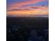 Stunning aerial view of community at sunset, showcasing scenic landscape at 2870 Pharr Court South Nw # 2407, Atlanta, GA 30305