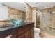 Modern bathroom with glass bowl sink and walk-in shower at 2870 Pharr Court South Nw # 2407, Atlanta, GA 30305