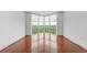 Bright bedroom with hardwood floors and large windows offering scenic views at 2870 Pharr Court South Nw # 2407, Atlanta, GA 30305